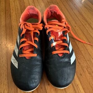 Bundle of soccer cleats & shin guards